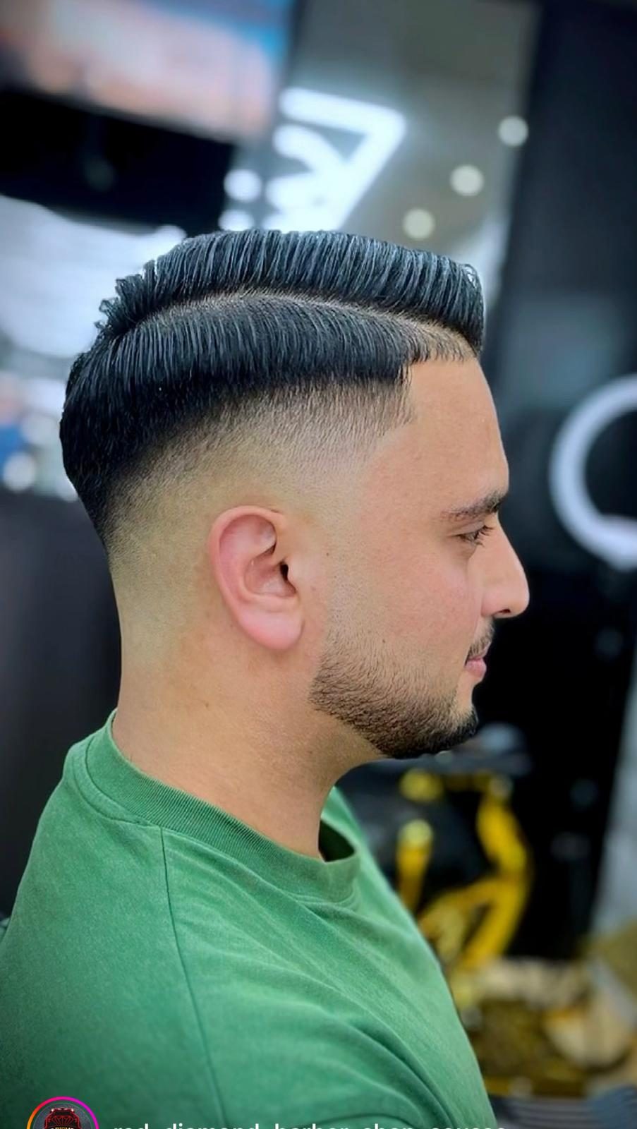 Finished pompadour with a high skin fade